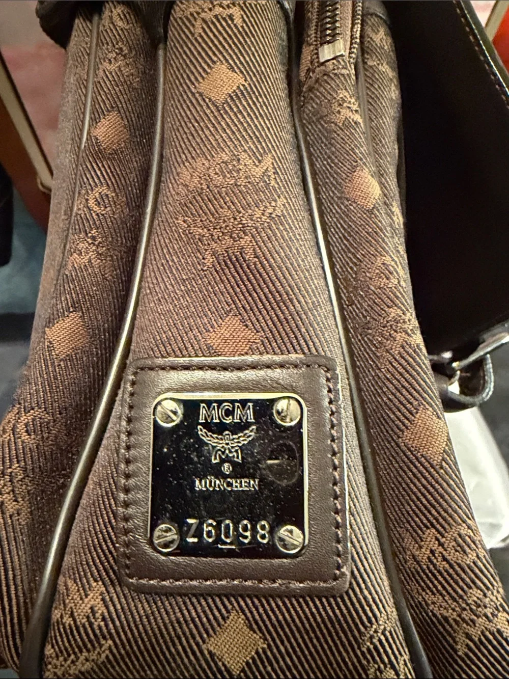 MCM Brown Leather Messenger Bag with Monogram Front Pockets